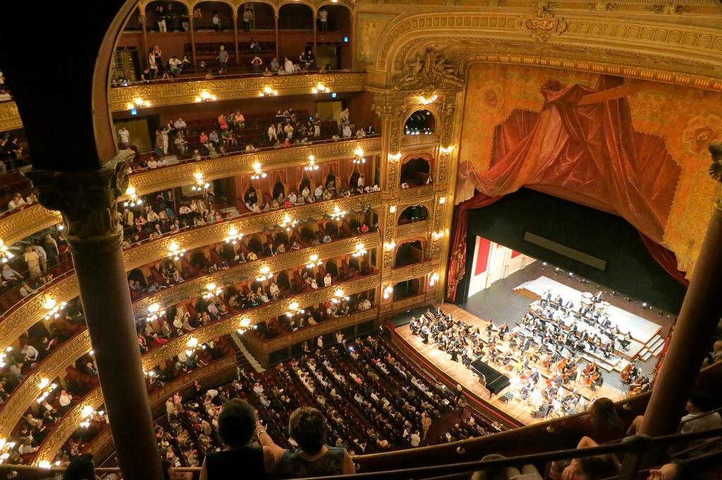 Vienna Philharmonic Orchestra performing in elegant concert hall
