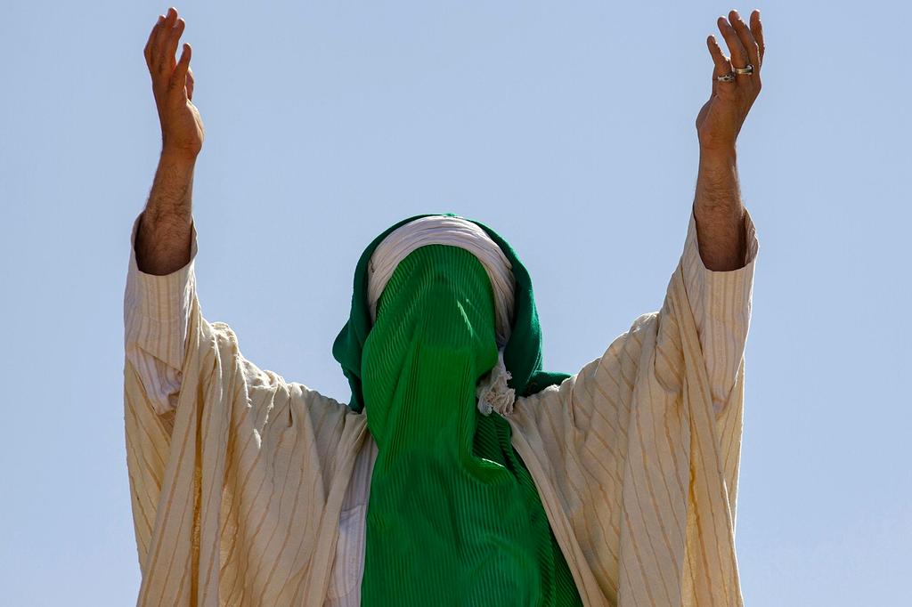 Elena Rodriguez, theater enthusiast smiling warmly