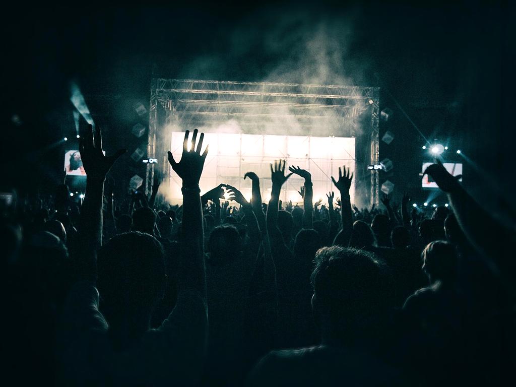 Stage with colorful lights and excited audience